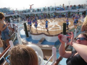Dancers on the Regal Princess during the sail away. Tips for first time cruisers.