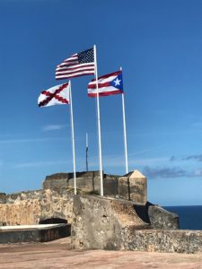 3 flags flying in Old San Juan
