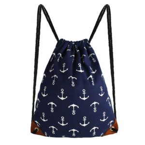 Navy blue anchor drawstring tote bag. Navy with blue anchors printed on it with two drawstrings on the side, converting it to a backpack.