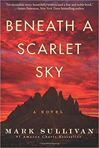 book cover of Beaneath a Scarlet Sky - mountains dark with a red cloudy sky above and yellow lettering