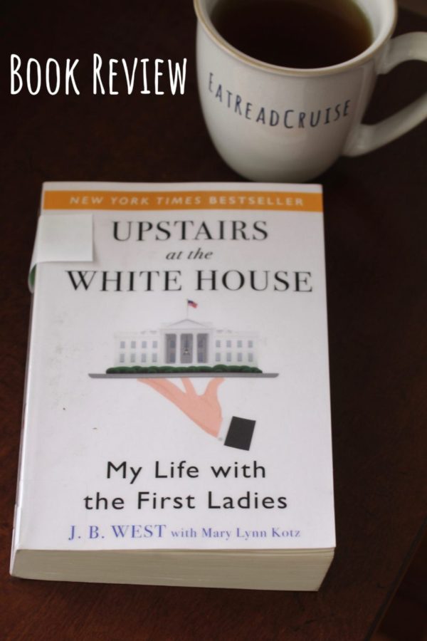 Paperback book, Upstairs at the White House: My Life with the First Ladies, with a cup of tea in a cream colored EatReadCruise mug off to the side