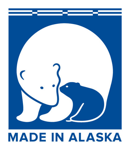 Bright blue and white bear logo saying "Made in Alaska"