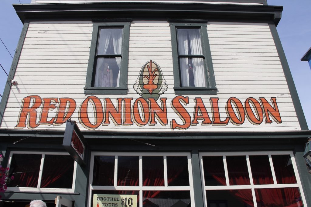Red Onion Saloon building (red and white). A Day in Port: skagway